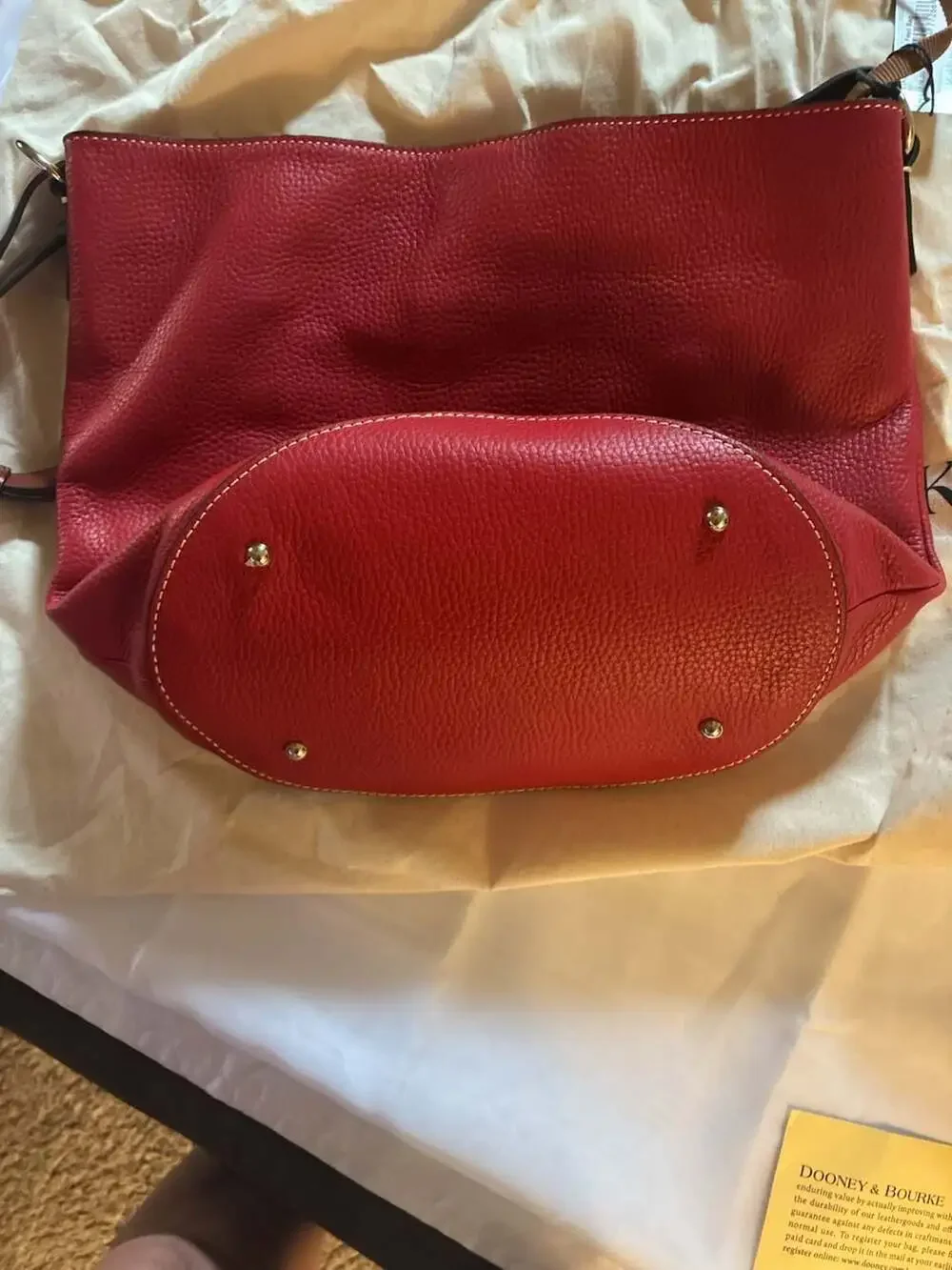 Dooney & Bourke Thea Feed Bag in Red Pebble Grain Leather